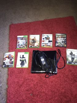 Xbox 360 console with 7 games