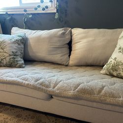 Small (two seatable) love seat couch.