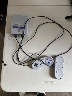 Super Nintendo with 2 controllers