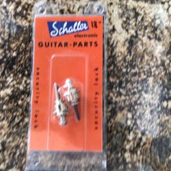 Guitar strap locks