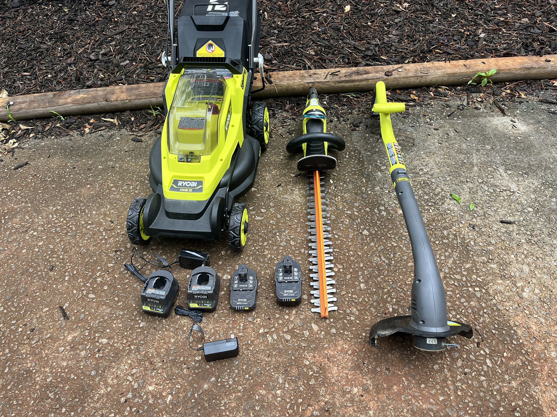 Ryobi 18 V 13 inch lawnmower, string trimmer hedge trimmer two batteries two charger used 160