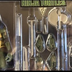 A243-   New Teenage Mutant Ninja Turtles, Leonardo And Shredder Action Figures