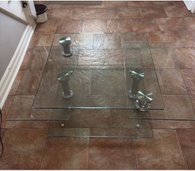 Maklaine 49.5" Tempered Glass Multi-Top Motion Cocktail Table in Clear