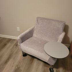 Chair With rolls and attached side table