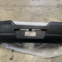 Nissan Versa hatchback bumper rear 07-12 ( new car parts )