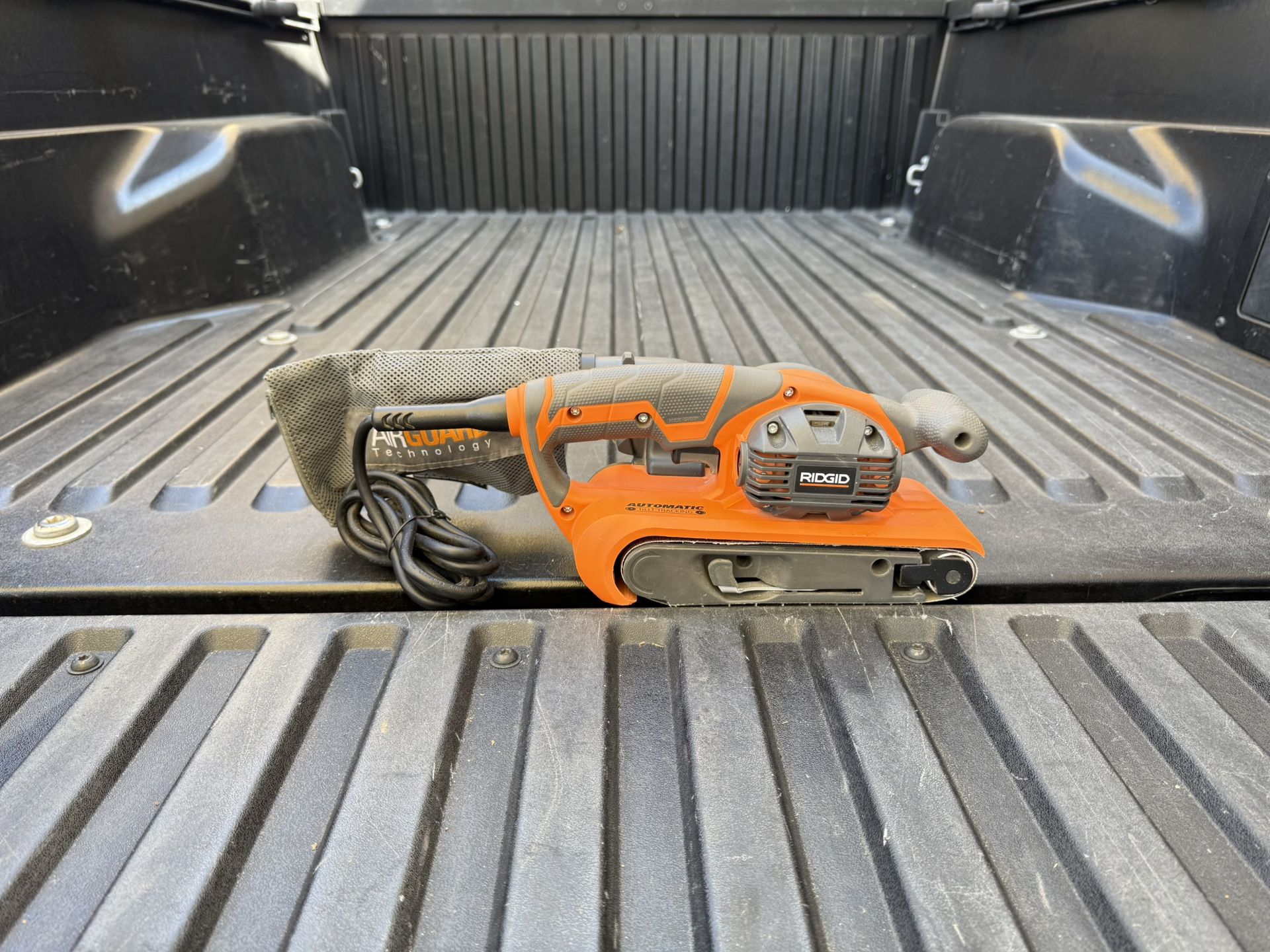 RIDGID 6.5 Amp Corded 3 in.W x 18 in.L Heavy Duty Variable Speed Belt Sander w/AIRGUARD Technology