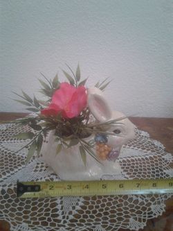 Artificial flowers in bunny pot $5