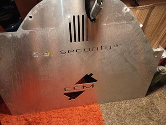 Cat security shield for undercar theft prevention