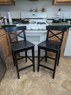 Two good sturdy wooden bar stools