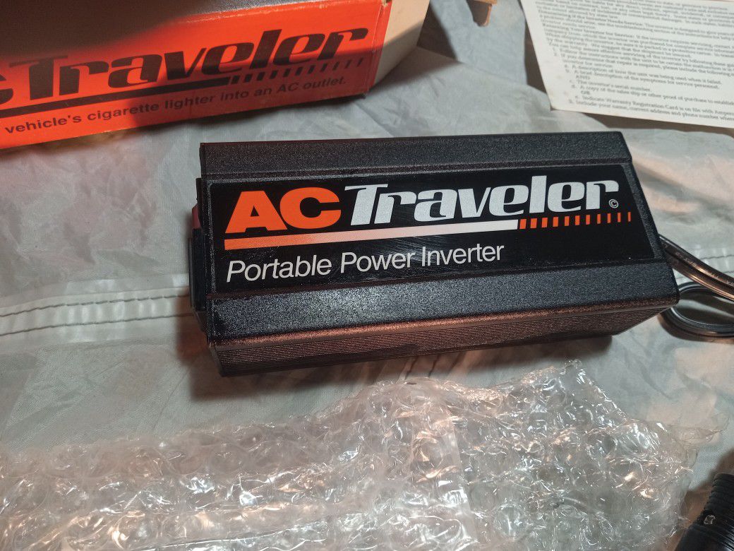 AC Traveler . Turns your Cars Cigarette Lighter into an AC 
