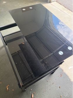 Adjustable glass coffee table