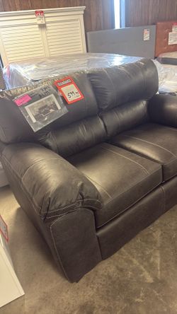 Brand new couch 599 brand new loveseat 599 brand new cocktail ottoman $299 brand new recliner that rocks that matches it for $400
