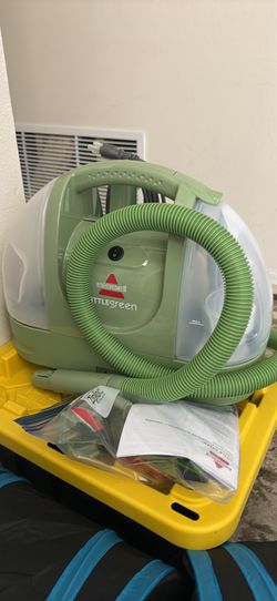 Brand new Bissell portable carpet cleaner