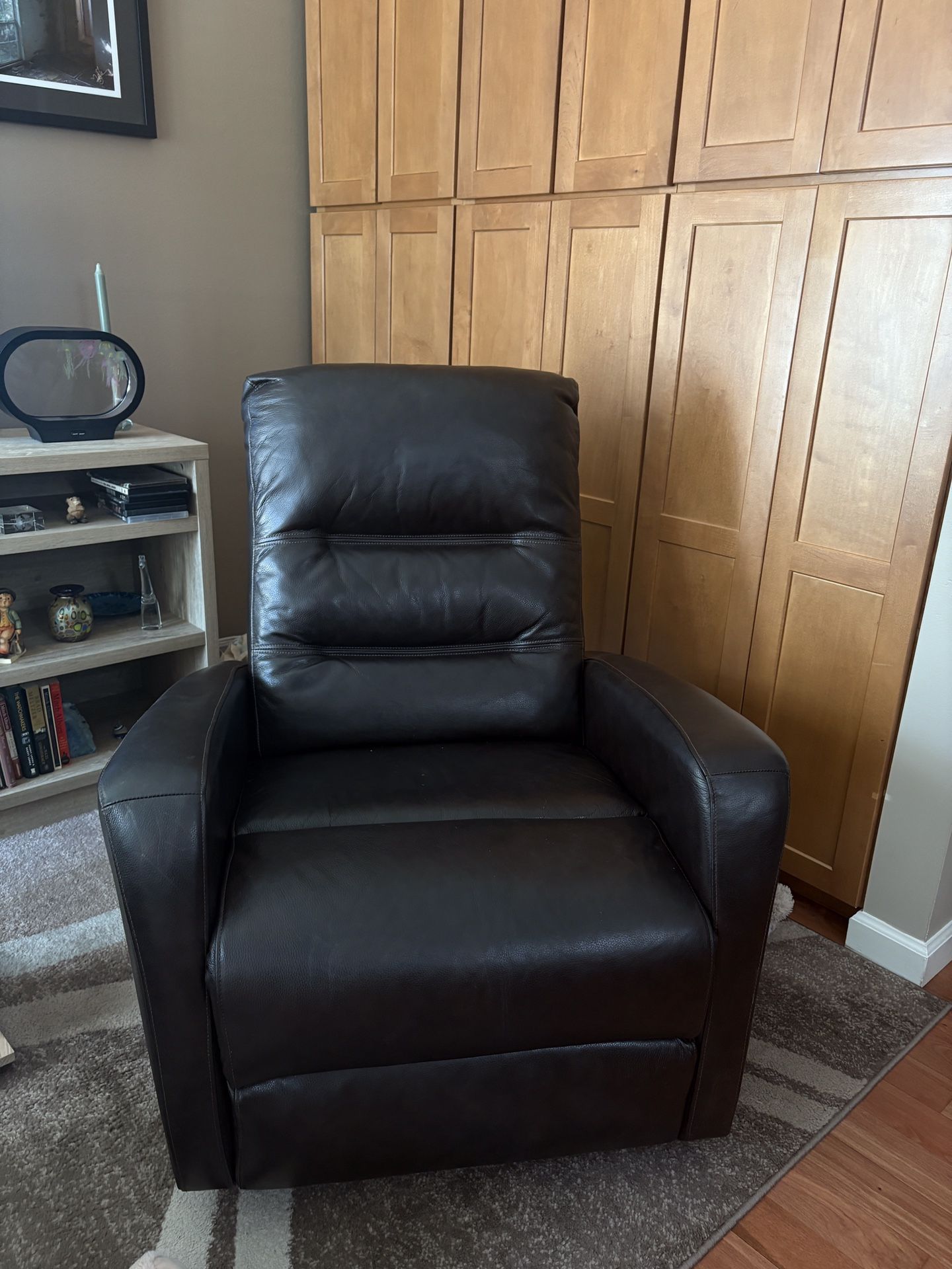 Leather Power Glider/Recliners With Adjustable Headrest.