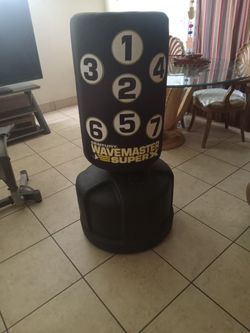 Century...WaveMaster...=SuperX.....punching  Bag Stand......150 Bucks