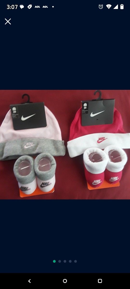 Nike Infant Hat and Pink/White and Pink/Grey ONLY $20 for both. Only sold as 1 lot. Retail Cost $15 ea. SAVING $10 when you buy both.