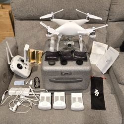 DJI Phantom 4 Quadcopter Drone w/accessories