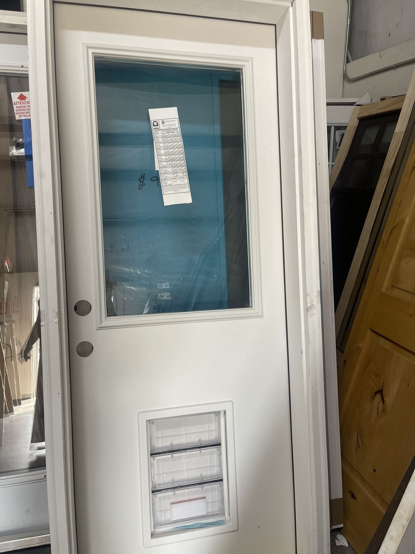32 In Right Hand Inswing Exterior Door With A Pet Guard.