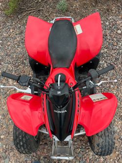 2014  trx90x        Will trade for nice Surron