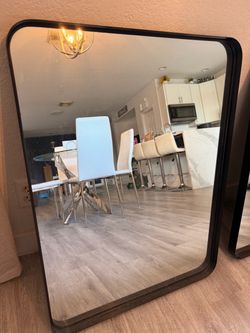 Bathroom/ hallway squared mirror . Black trim