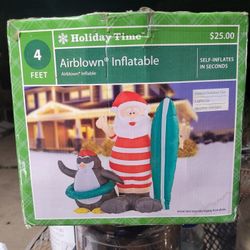 Santa And Penguin Inflatable