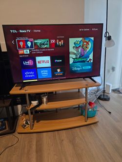 Move out sale TCL 49" 5 series 4K HDR Smart LED TV and Dolby vision HDR with Roku. Table added.