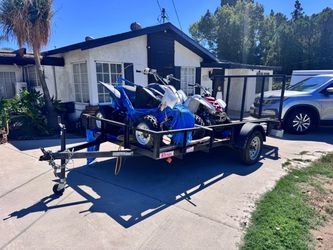 Utility trailer and Quad