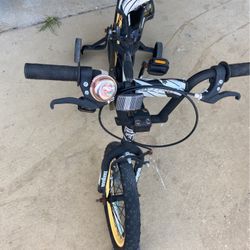 Boys bike with training wheels