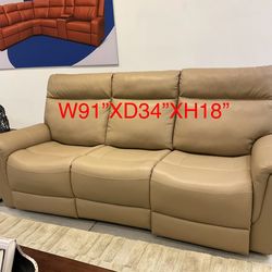 New Dual power recliner Sofa with power adjustable headrest.