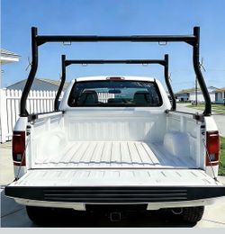 Adjustable truck ladder rack fits most full-size pickup trucks (49"-73" width).