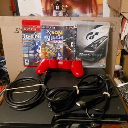Playstation 3 slim + 4 games 