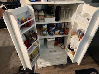 Stand alone storage cabinet