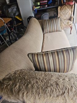 Beige Fabric Sofa with Striped Accent Pillows