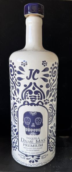 2 Empty Matching Dame Mas Reposado Bottle 