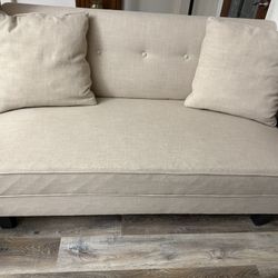 Beige Sofa With 2 Matching Pillows 