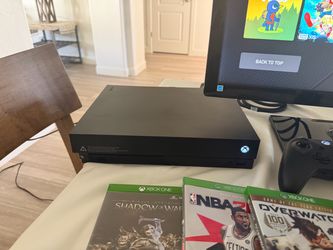 Microsoft Xbox One X Console 1TB - Black, 2 Controllers, wireless headset, 3 Games