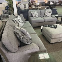 Brand New Sofa And Loveseat In Gray. 