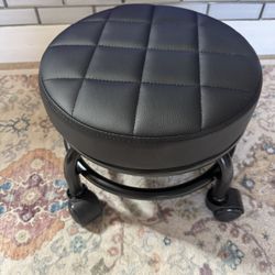 Brand new**Furwoo Black rolling hobby stool not height adjustable 