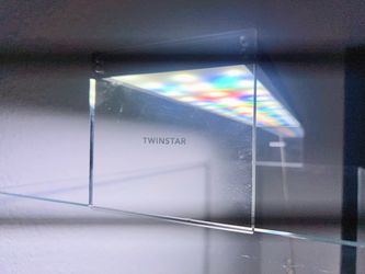 UNS 60U rimless aquarium with Twinstar 600ES RGB light