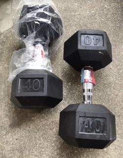 4 sets of rubber hex dumbbells. BRAND NEW