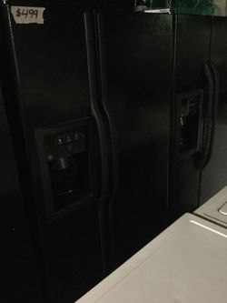 Black side by side refrigerators / one year warranty/ delivery and installation are available