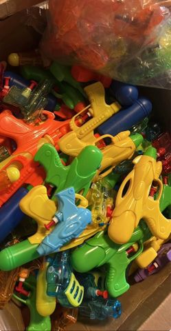Bulk Lot of 94 Assorted Plastic Water Guns new in box