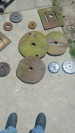 Iron cut weights and standard plates with rack