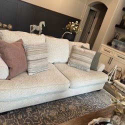 Pair of Monaghan couches by Ashley with 2 pottery barn pillows (Stripe)