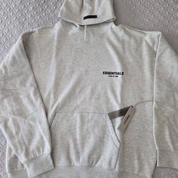 Light Oat. Essentials Hoodie