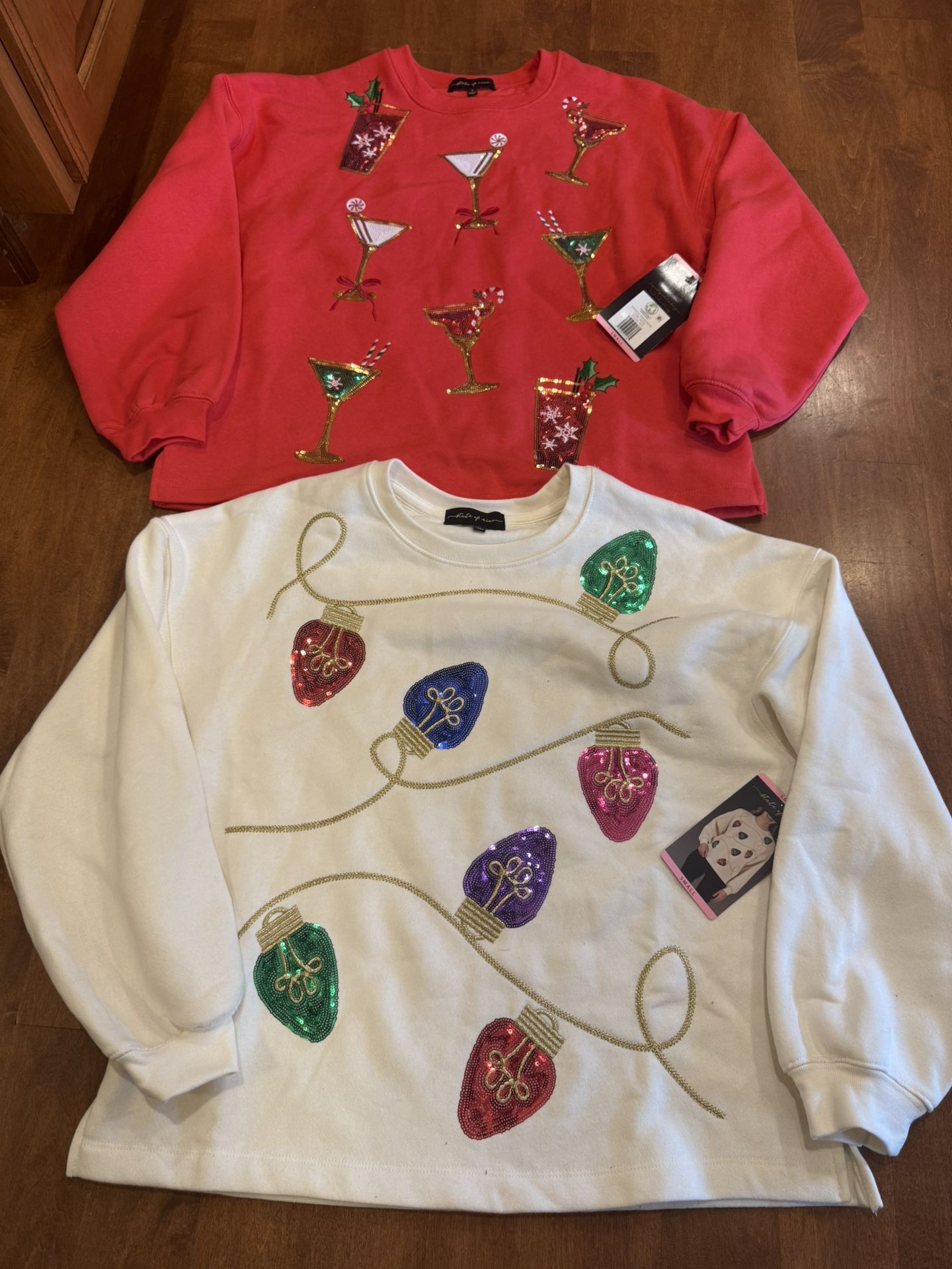 Woman’s brand new with tags bling sweatshirt, bundle shipping available