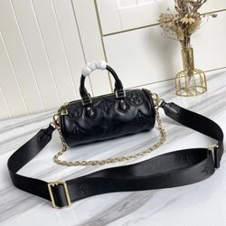 The handbag is crafted with soft padded cowhide to create a sophisticated design, and embroidered with a classic pattern. It cleverly uses a detachabl