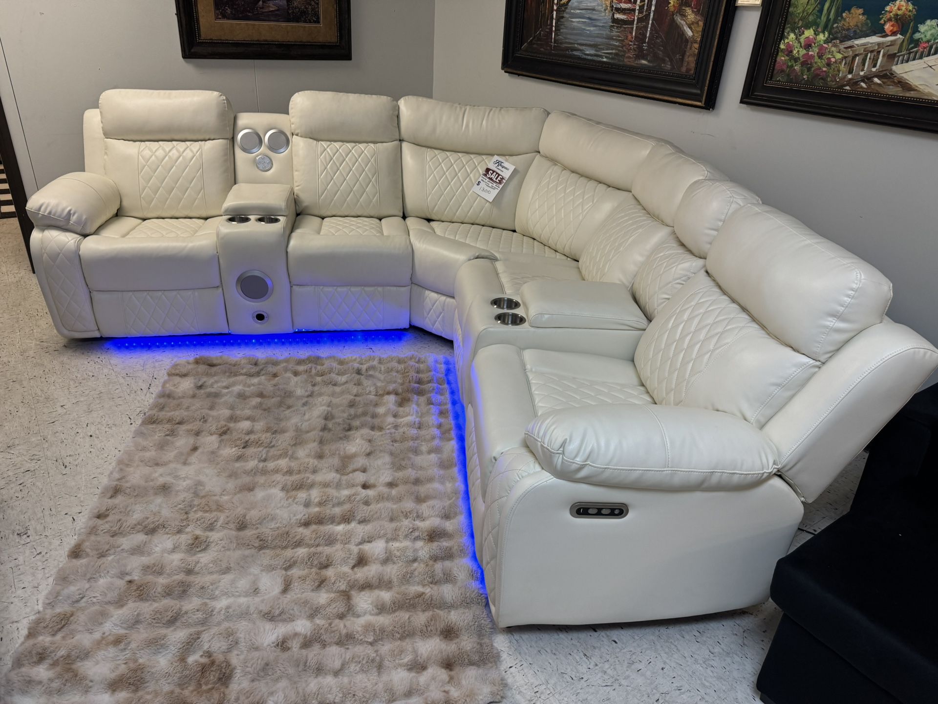 WHITE LEATHER ELECTRIC RECLINER SECTIONAL WITH SPEAKER SYSTEM