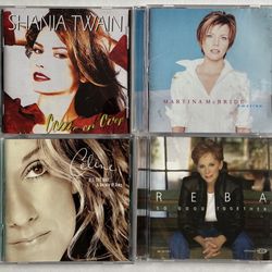 4 CD’s- Celine Dion/ Shania Twain/ Reba McEntire/ Martina McBride