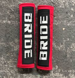 Bride racing seat belt pads